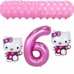 Set festiv format din 13 baloane, incluzând zece baloane din latex roz cu buline albe, un balon din folie gigant în formă de cifra 6 de culoare roz metalizat și două baloane din folie tip figurină reprezentând personajul Hello Kitty purtând rochițe fucsia