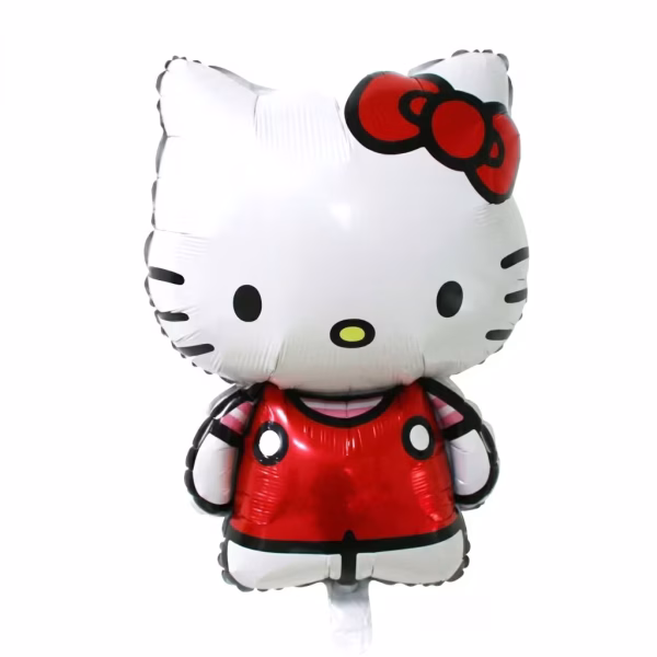 Balon din folie metalizată decupat pe contur în formă de figurină, reprezentând personajul Hello Kitty purtând o rochiță roșie și o fundiță asortată pe ureche