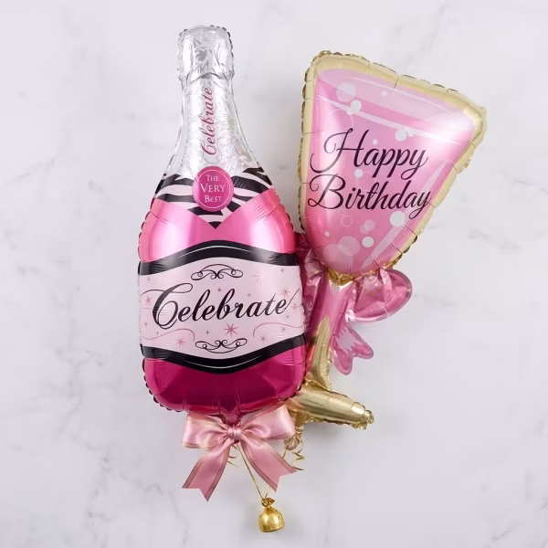 Set format din doua baloane mari din folie metalizata reprezentand o sticla roz de sampanie cu textul Celebrate si un pahar asortat cu mesajul Happy Birthday