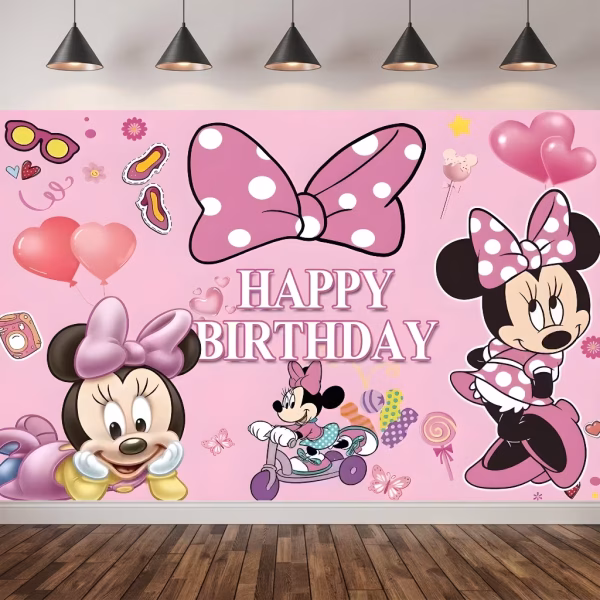 Background Textil Minnie Mouse Cod 158B Mockup cu un background textil pentru panou foto cu tematica Minnie Mouse, ilustrand o fundita mare roz cu buline, personajul Minnie in diverse ipostaze vesele, inimi 3D si dulciuri sub textul Happy Birthday.