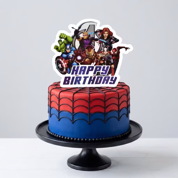 Tort festiv in nuante de rosu si albastru cu design panza de paianjen decorat cu topper din carton Avengers Happy Birthday ilustrand supereroi Marvel