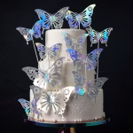 set 10 toppere tort fluturi argintii Set 10 toppere fluturi argintii cu efect holografic si tije metalice aplicati pe un tort etajat elegant