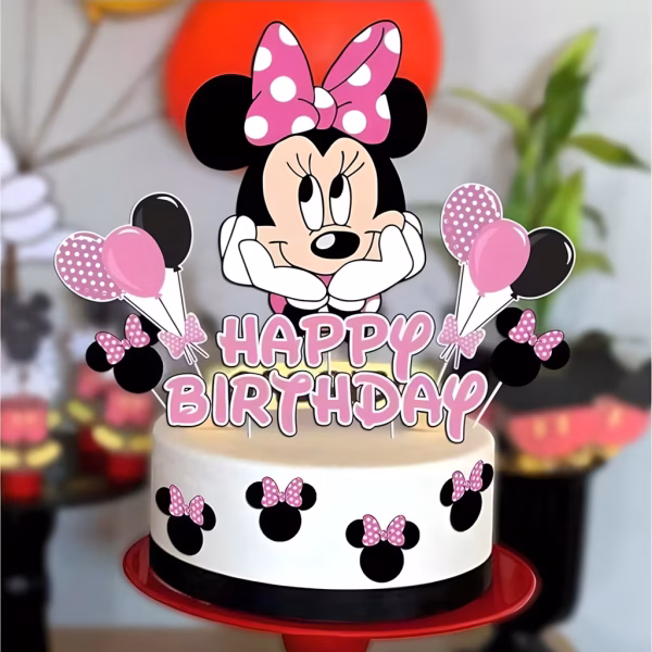 Set 10 Toppere Tort Minnie Mouse Tort festiv decorat cu un set de 10 toppere din carton cu tematica Minnie Mouse, incluzând personajul Minnie, textul Happy Birthday roz și baloane cu buline.