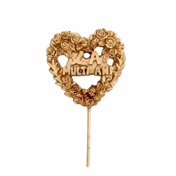 Lumanare Inima Aurie La Multi Ani 14 cm Lumanare eleganta pentru tort in forma de inima aurie decorata cu trandafiri in relief si mesajul central La Multi Ani