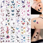 Set de 30 coli cu tatuaje temporare reprezentand fluturi multicolori in diverse stiluri artistice aplicate pe umar spate si picior
