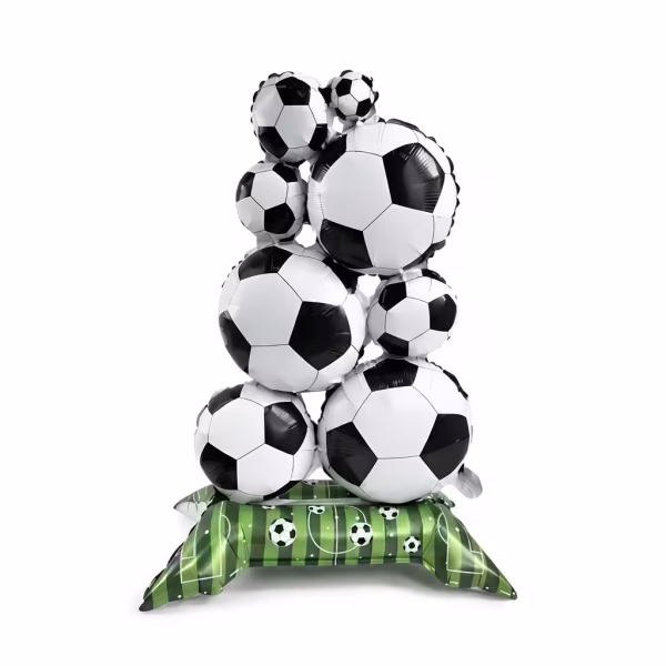 balon folie mingi de fotbal pe suport Aranjament gigant din balon folie, dimensiune 98x56 cm, reprezentand o stiva de mingi de fotbal alb-negru asezate pe un suport verde ce imita un teren de fotbal. Model tip Airwalker.