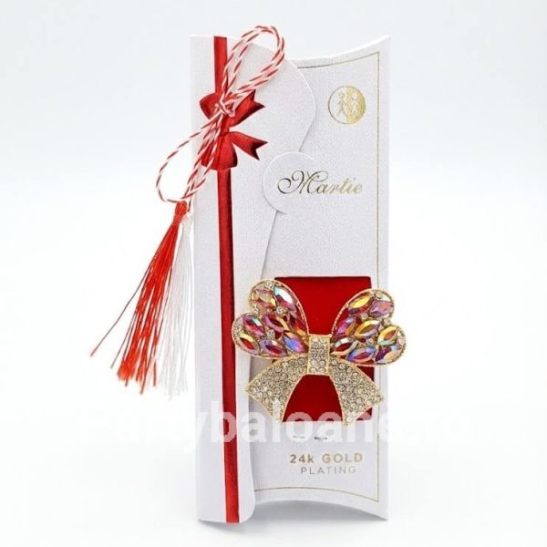 Mărțișor Broșă Fundiță cu Cristale Roșii și Aur 24K – Cadou Premium (5 cm) Martisor brosa fundita aurie cu cristale rosii si pietre clare cutie premium