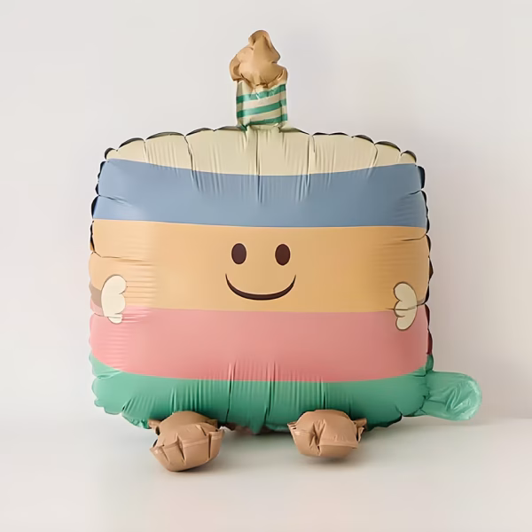 Balon Folie Tort Aniversar Pastel 62x39 cm Balon din folie premium in forma de tort aniversar in dungi pastelate cu fata zambitoare si lumanare dimensiune 62 cm.