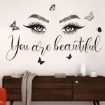 Sticker perete ochi you are beautiful cod 565 Sticker perete ochi you are beautiful cu fluturi aplicat deasupra unei comode elegante