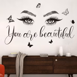 Sticker perete ochi you are beautiful cod 565 Sticker perete ochi you are beautiful cu fluturi aplicat deasupra unei comode elegante