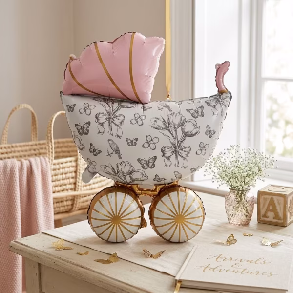 Balon Folie Figurina Carucior Vintage Roz 92 cm Balon din folie premium in forma de figurina carucior vintage roz cu imprimeu floral fluturi si roti aurii dimensiune 92x63 cm.
