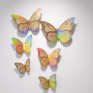 Set 6 fluturi 3D gigant aurii irizati pentru perete si arcade Fluturi 3D gigant aurii irizati aplicati pe un perete luminos si pe o arcada organica din baloane albe si aurii