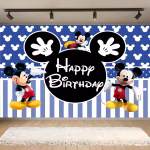 Background Textil Mickey Mouse 160x100 cm (COD 710B) Background decorativ din material textil premium, tematica Mickey Mouse, ilustrand personajul in multiple ipostaze pe un fundal cu dungi albastre si siluete albe, cu textul Happy Birthday in centru, 160x100 cm.