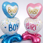 Doua baloane mari din folie tip airwalker cu sustinere proprie, in variantele Baby Boy (albastru) si Baby Girl (roz), ideale pentru petreceri de tip gender reveal.
