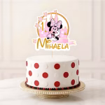Topper Tort Personalizat Minnie Mouse Topper tort personalizat Minnie Mouse cu castel roz, stelute aurii, numele Mihaela si cifra 1 pe un tort alb cu buline rosii