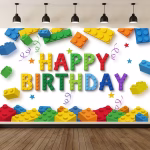 Background Textil Lego Cod 773B Mockup cu un background textil pentru panou foto cu tematica Lego, ilustrand cuburi de constructie 3D cazand pe un fundal alb luminos, cu textul Happy Birthday format din piese colorate.