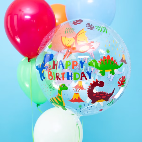 Balon Bobo Transparent cu Dinozauri Happy Birthday Balon rotund transparent din poliuretan cu imprimeuri colorate de dinozauri si mesajul Happy Birthday.