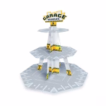 Suport Etajat Pentru Prajituri Masini Cars Suport etajat pentru prajituri din carton presat, design tip parcare garaj, avand 3 niveluri decorate cu marcaje rutiere, folosit frecvent pentru torturile din dulciuri la gradinita.