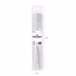 Ambalajul original al traversei de masa argintii indicand dimensiunile de 275 pe 28 centimetri.