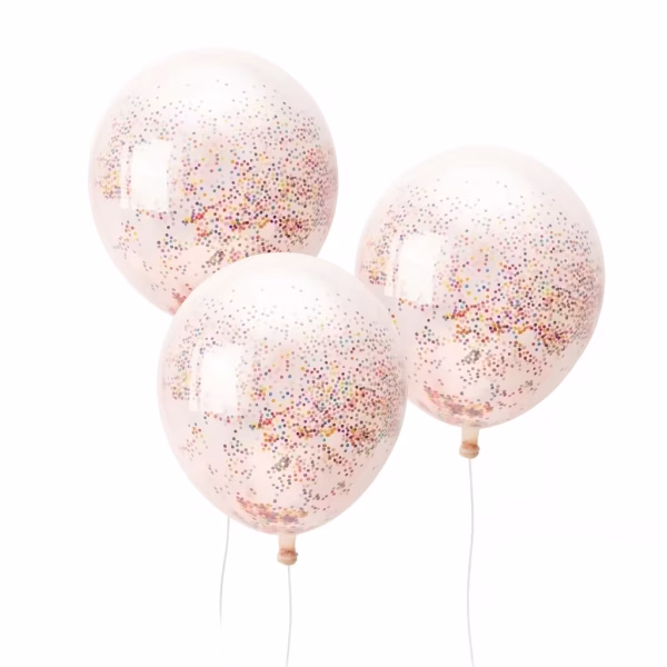 Trei baloane din latex transparent umflate, avand in interior confetti din bilute mici si colorate de polistiren care s-au electrizat si s-au lipit uniform de peretii interiori ai baloanelor