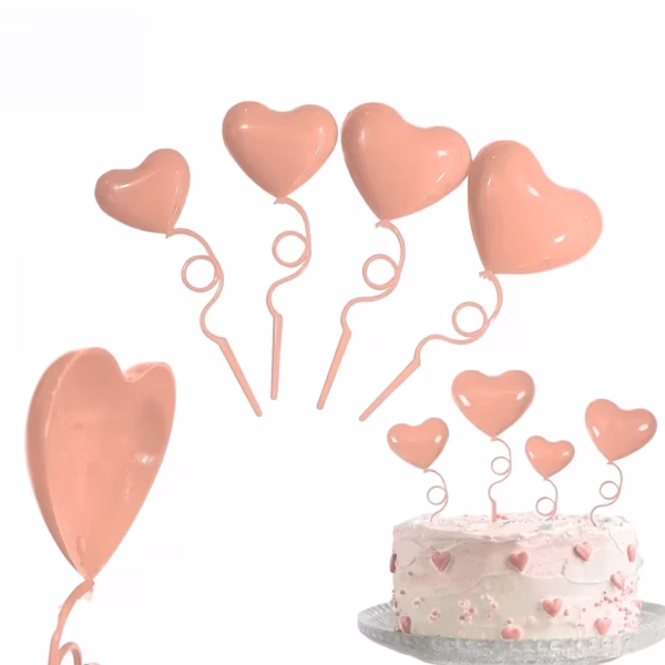 Comanda set 4 ornamente topper tort tip inima baloane in nuanta somon pastel. Realizate din plastic rezistent, dimensiuni variate pentru un decor romantic cu volum.