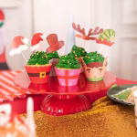 Set de 24 decoratiuni pentru briose de Craciun incluzand toppere pe bat si ambalaje decorative cu modele asortate de iarna